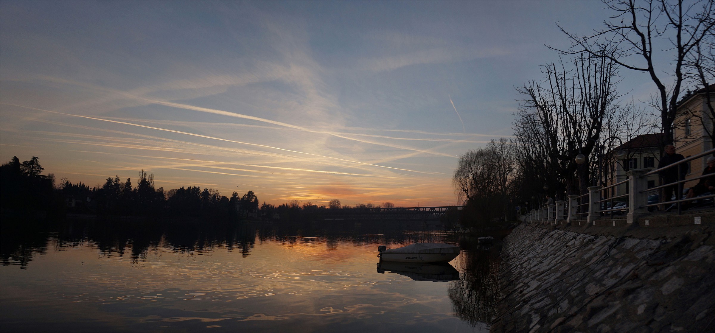 Sunset Epiphany with contrails of airliners...