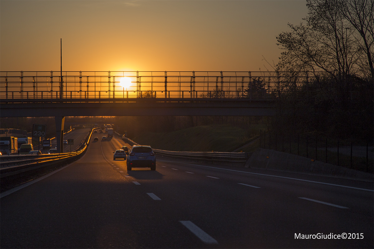 sunset by motorway...