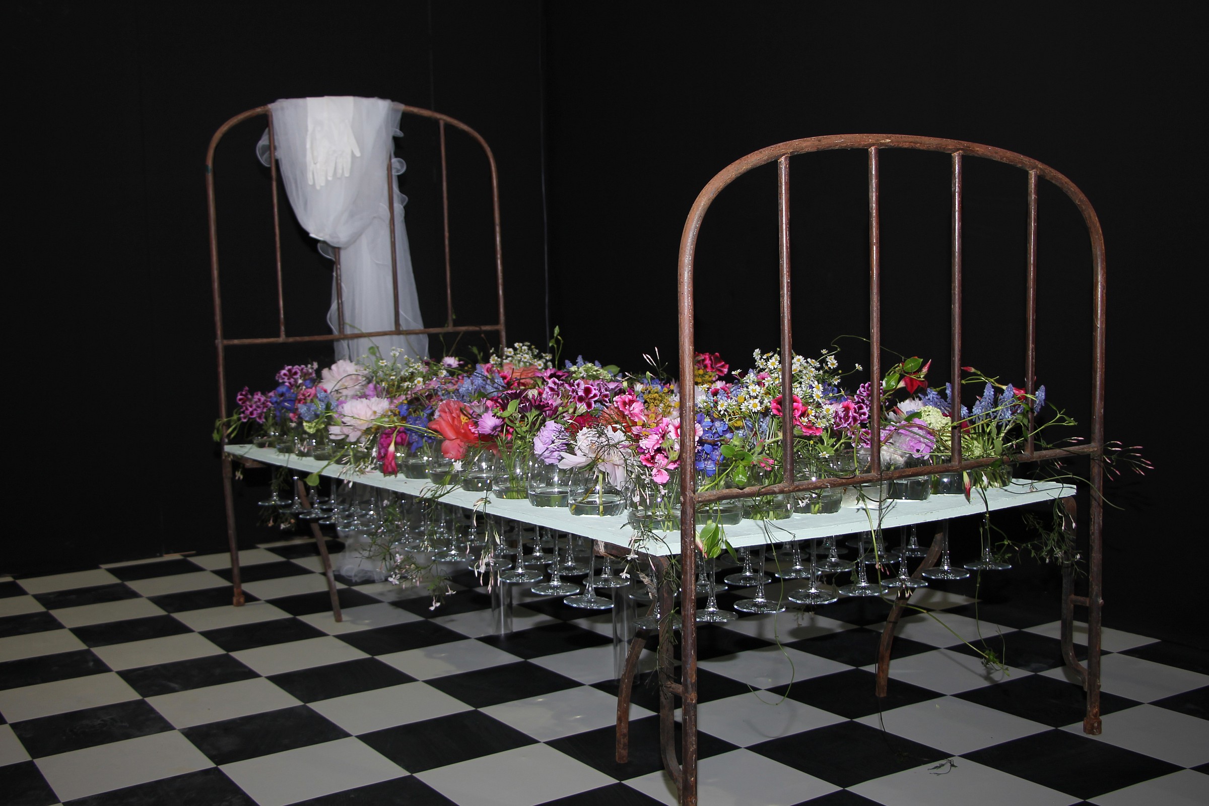 bed of flowers and goblets...
