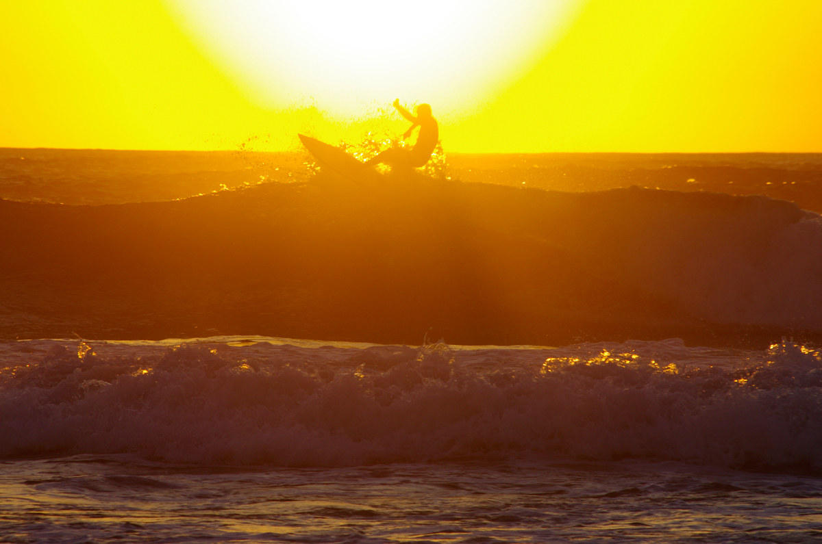 Surf at sunset in Porto Ferro...