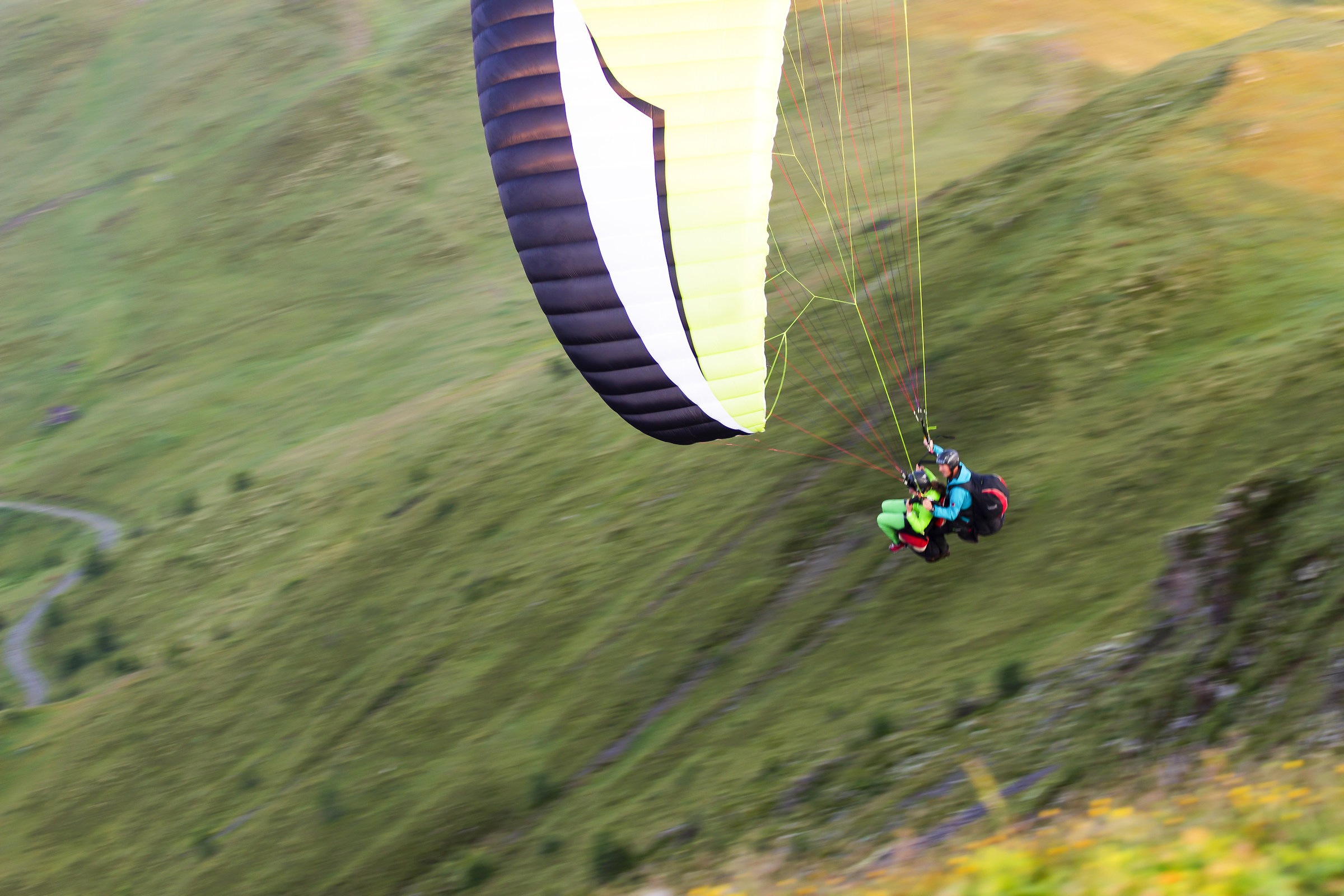 Tandem paragliding dawn...