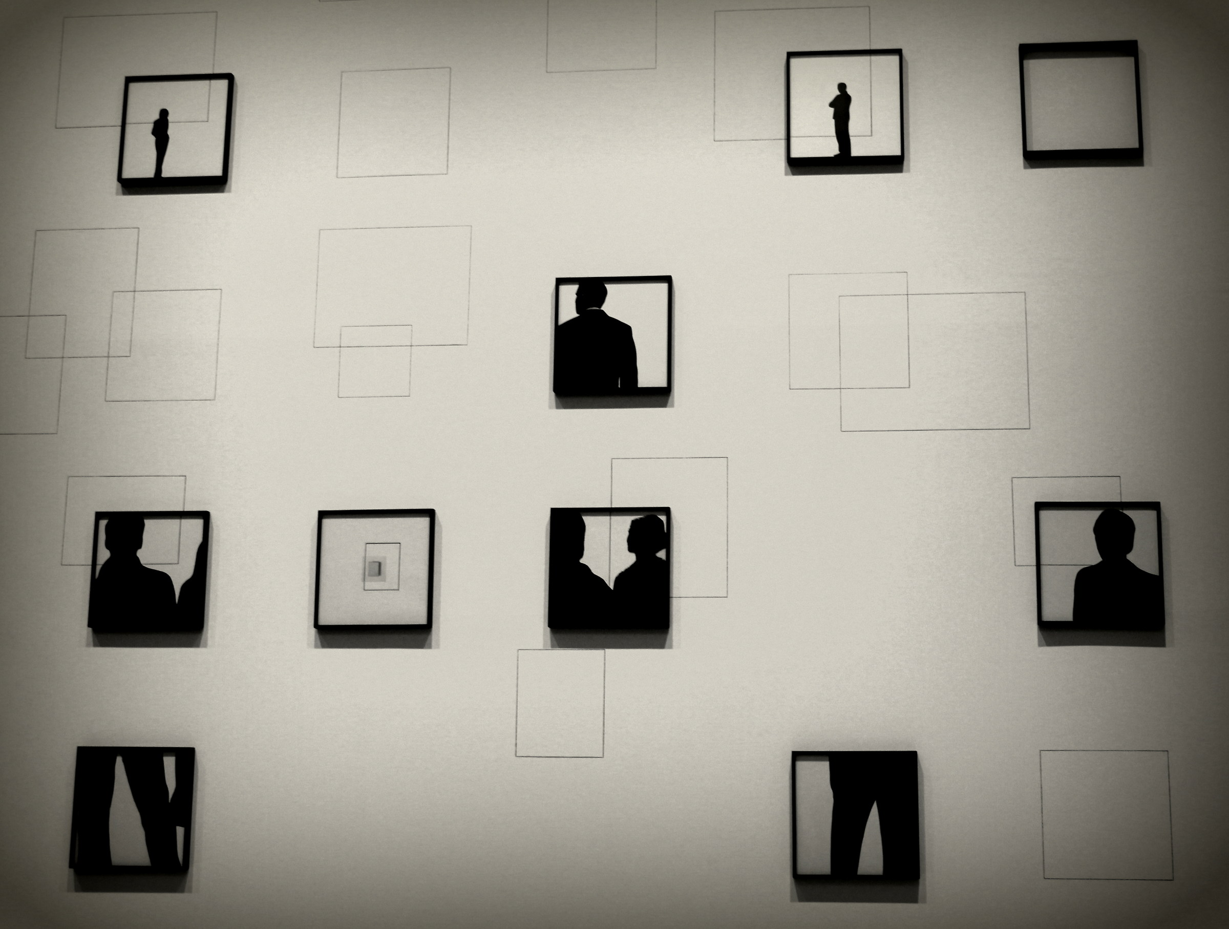 Wall with pictures in b / w...