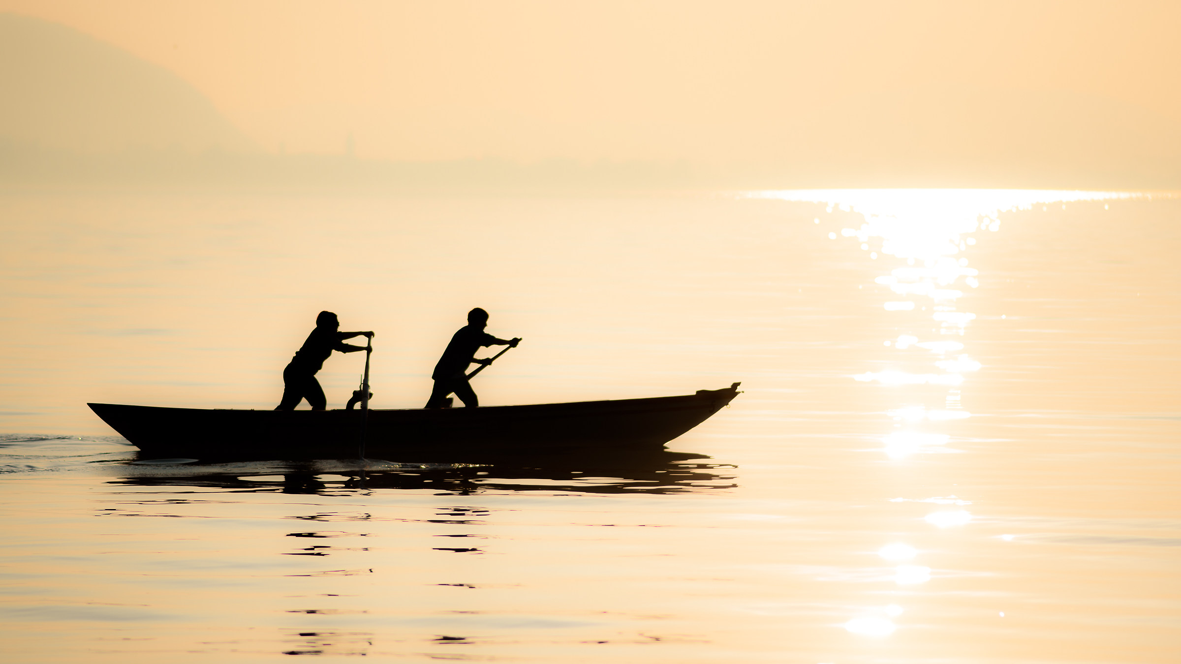 Rowing at sunset on Lake Iseo...
