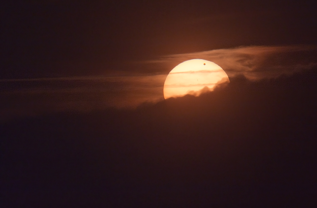 The transit of Venus in the clouds of dawn...