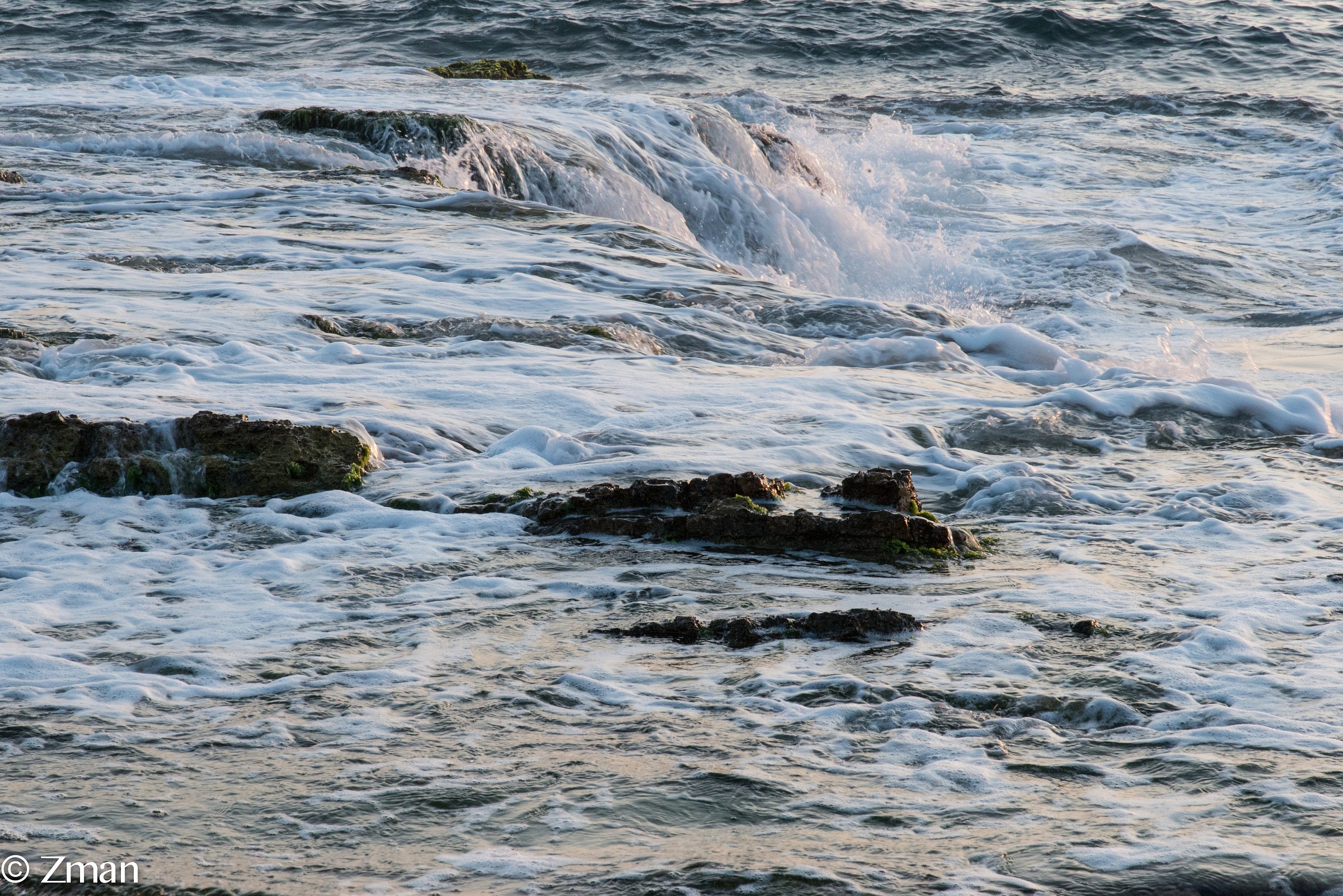 The Alrawshe shore line. Waves breaking on the Rocks...