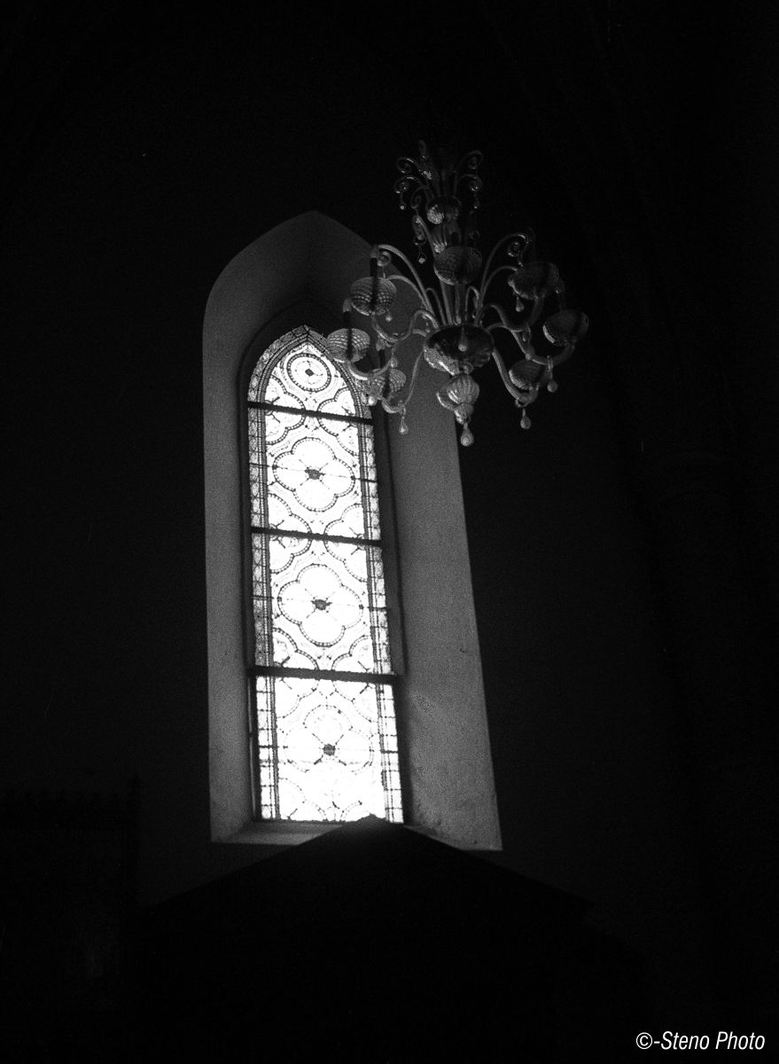 The stained-glass windows...