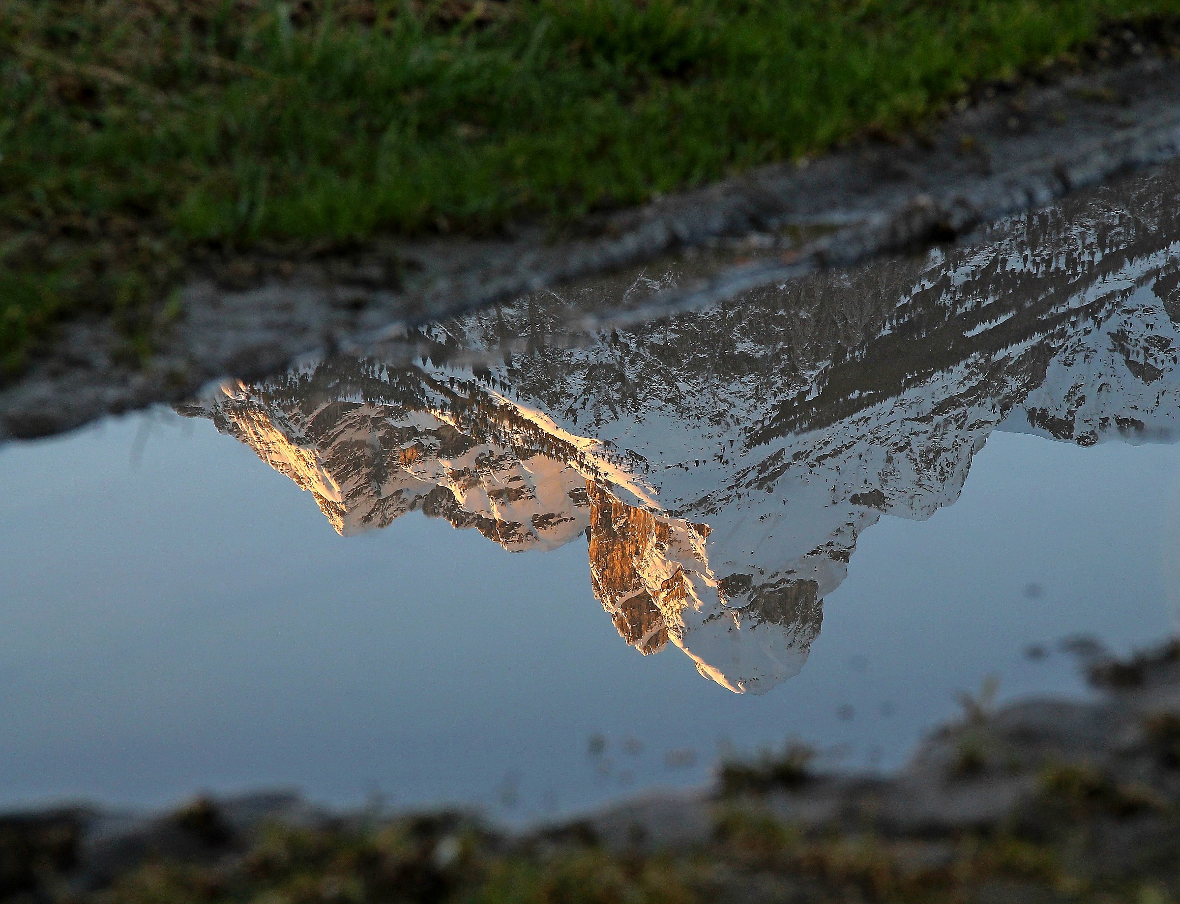 The Monte Pizzocco Mirrored In A Puddle On the Water ........