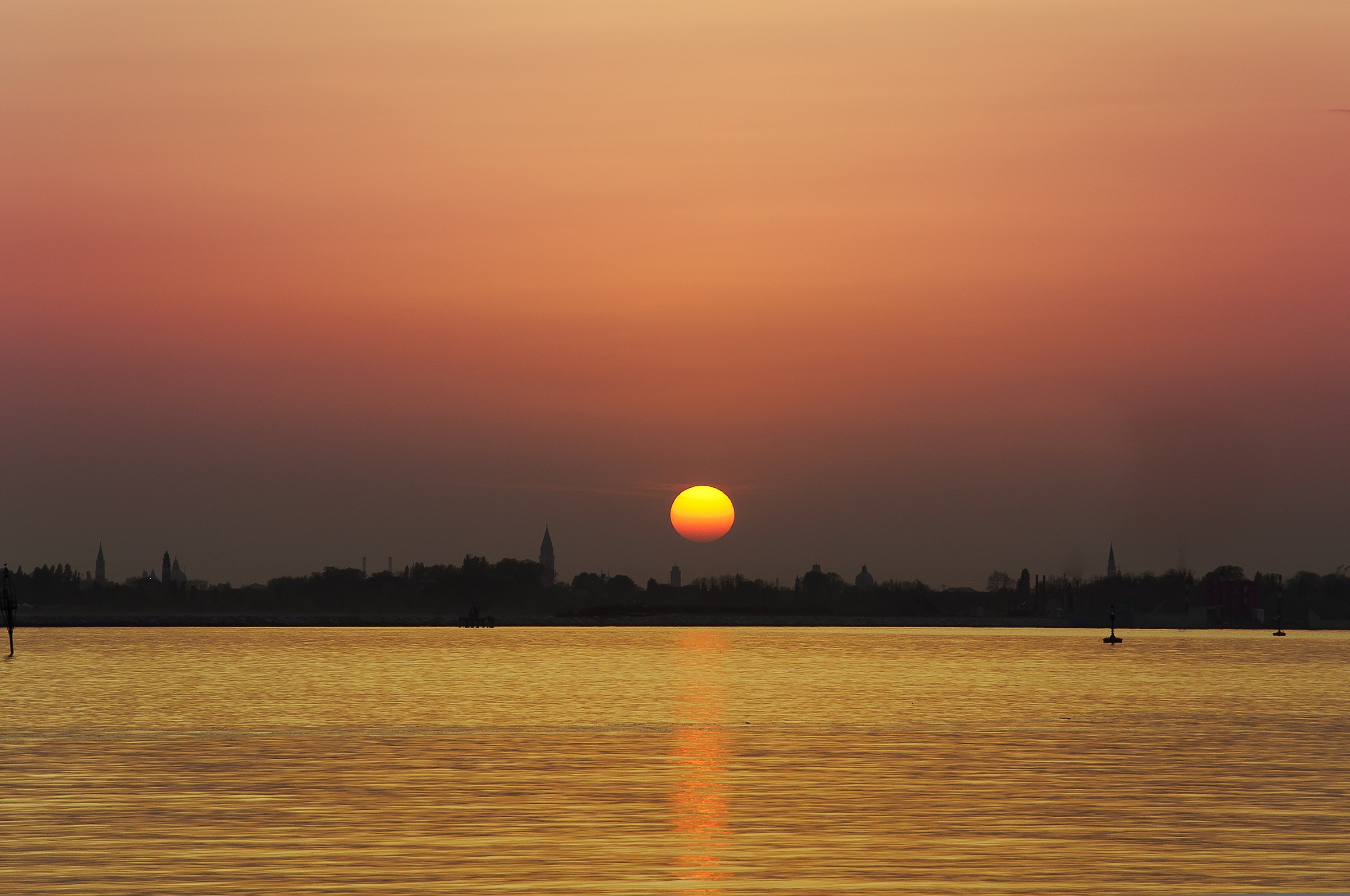 Sunset on the lagoon with a view of San Pietro in Castello...