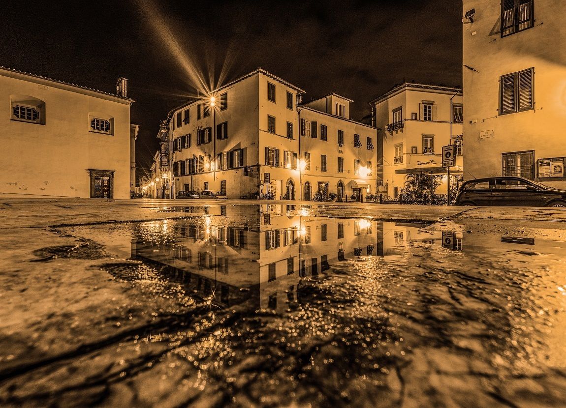 puddle in front of the Basilica of San Frediano - Lucca...