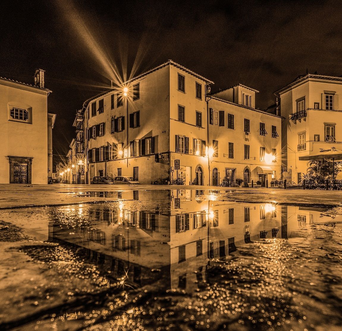 pozzanghera davanti Basilica di San Frediano...