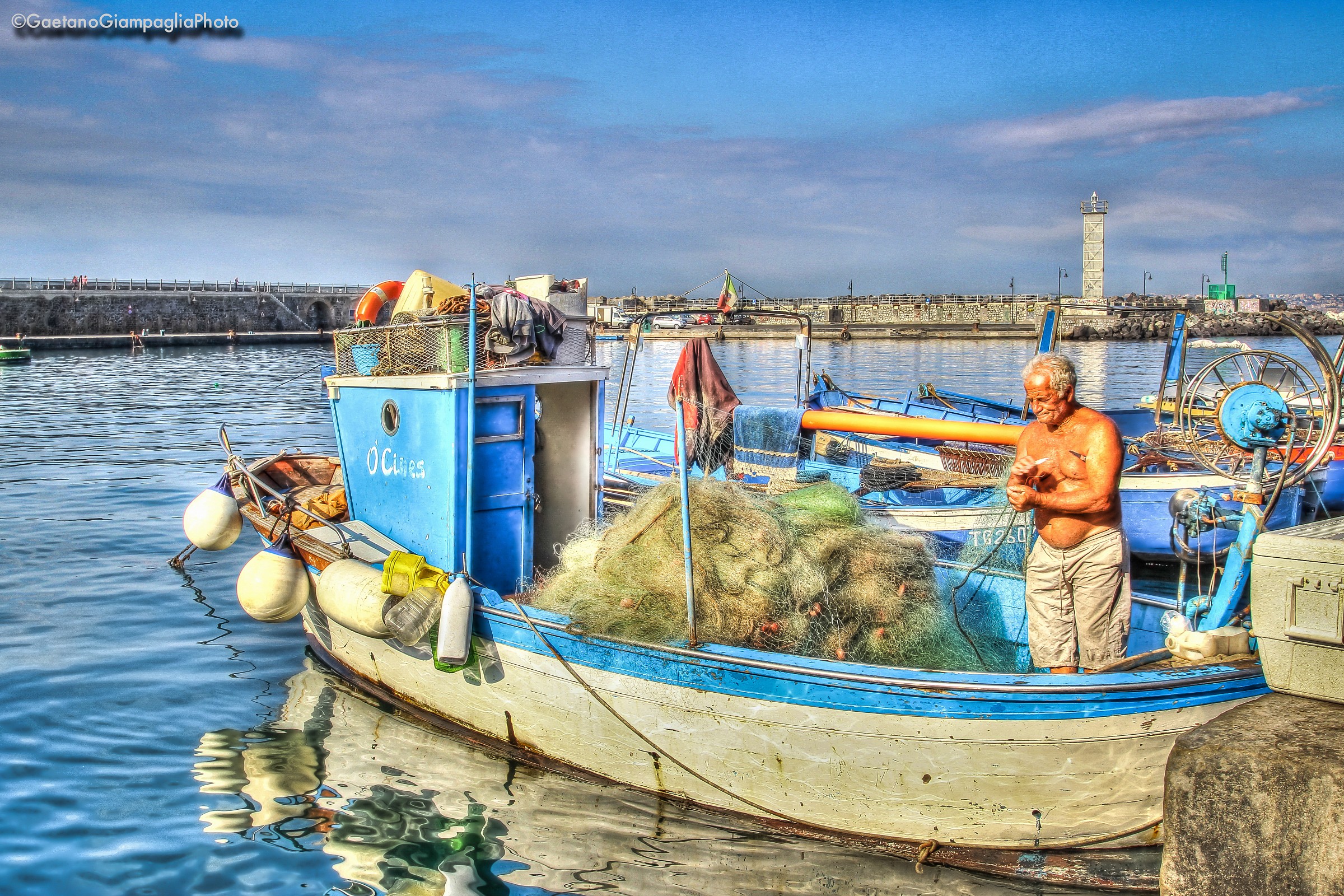 Fisherman at Port Granatello...