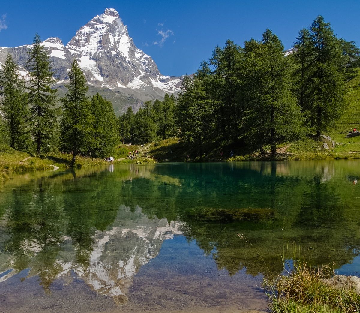 Matterhorn mirrored in the blue lake....