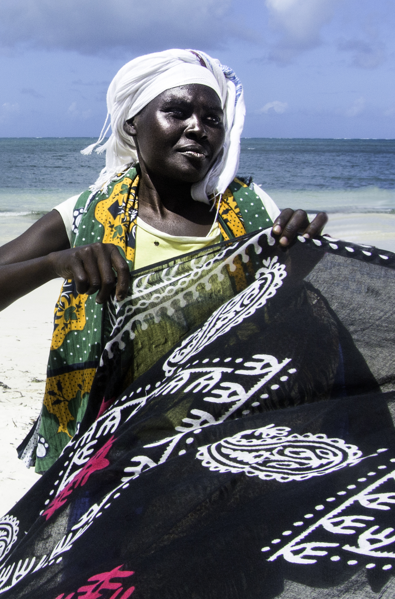 woman selling sarongs...