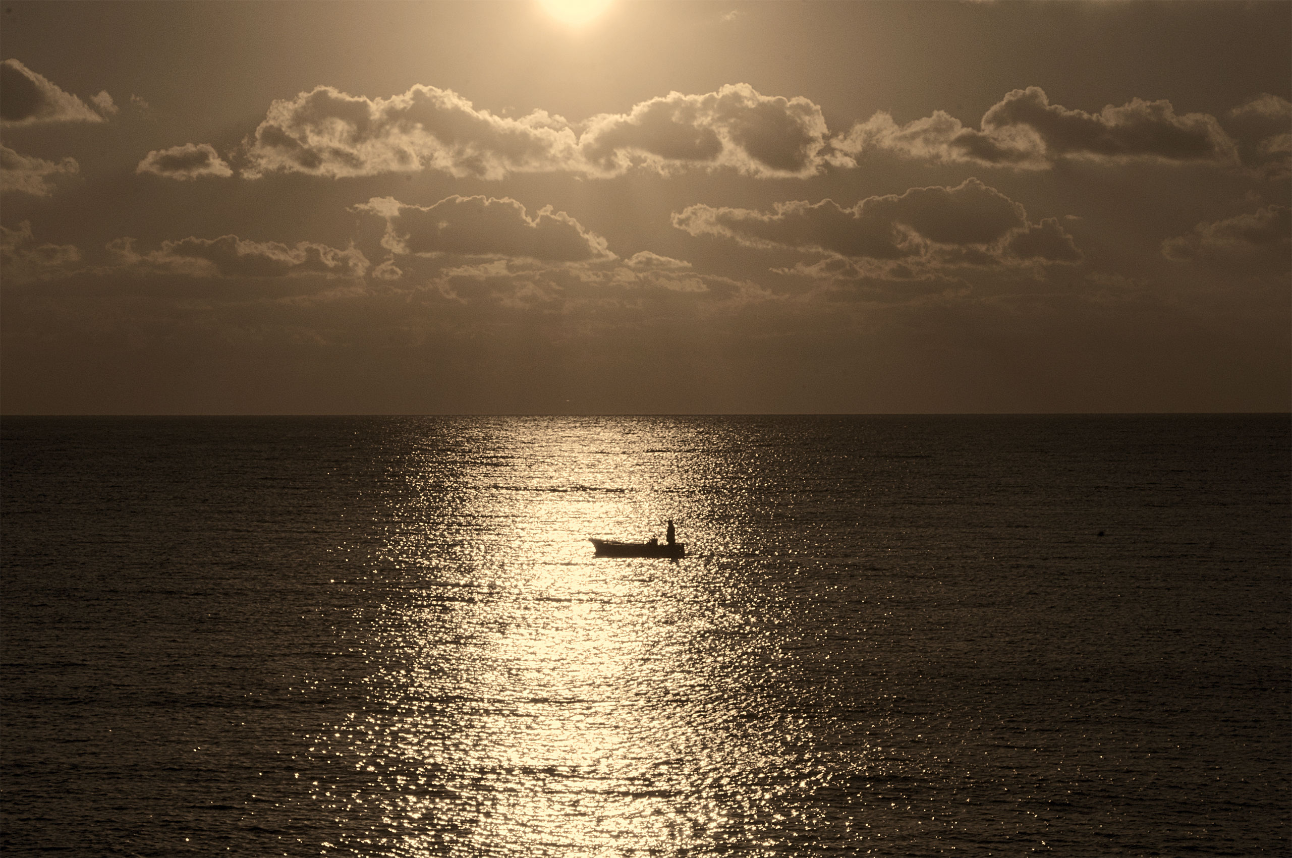 Pescatore al tramonto     Paesaggio...