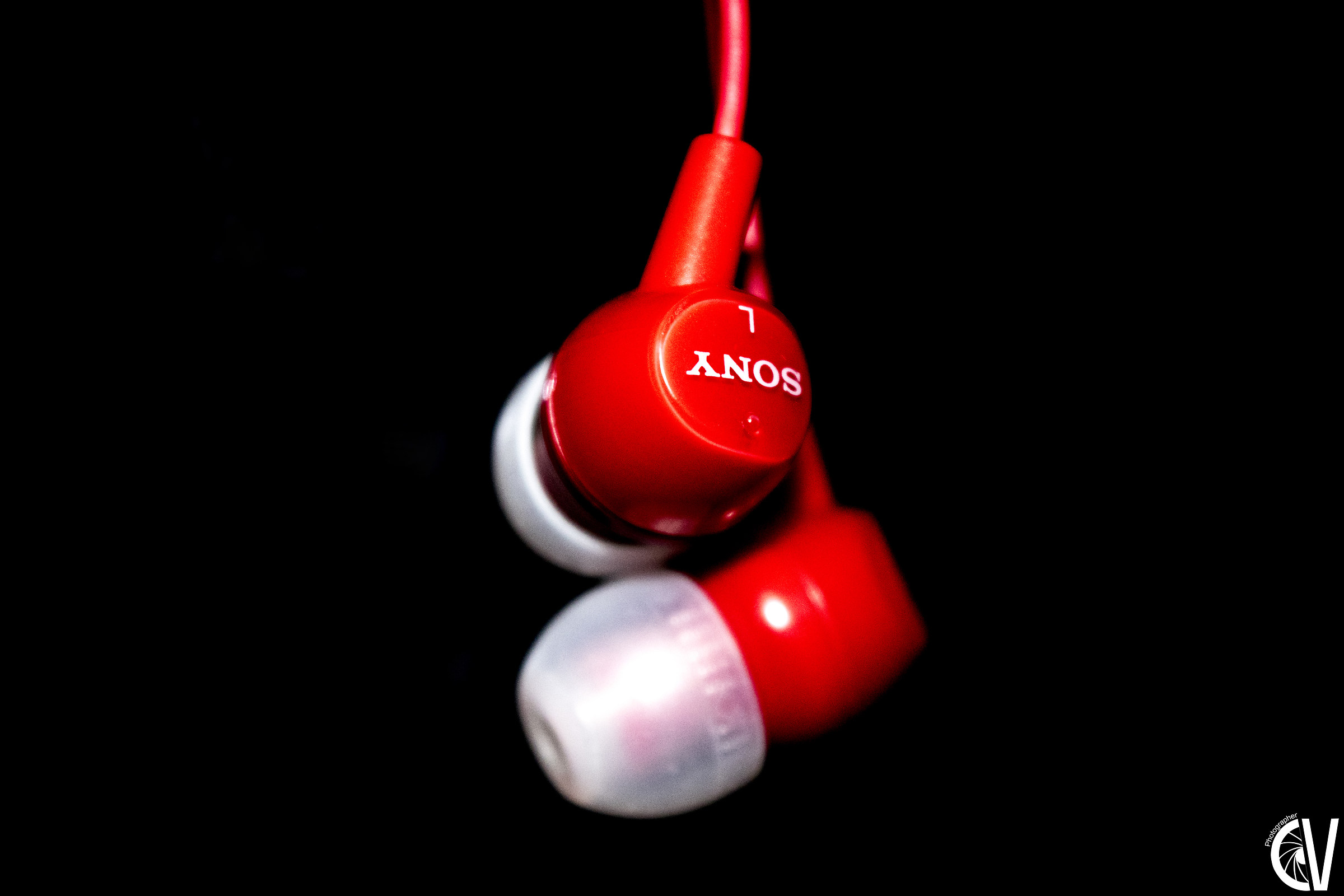 Abstract photograph of simple Sony earphones...