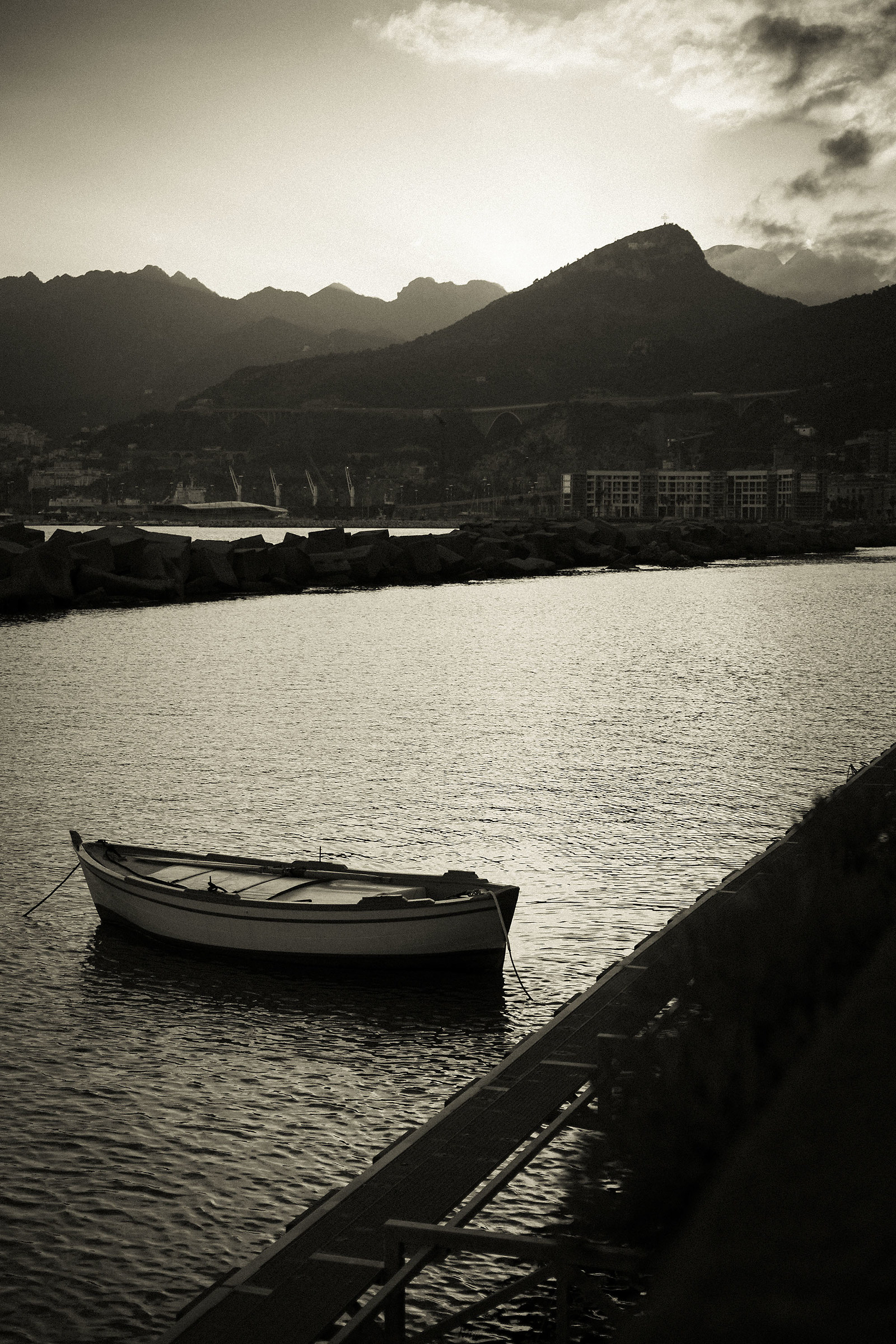 Postcard with boat and eco-monsters in the background...