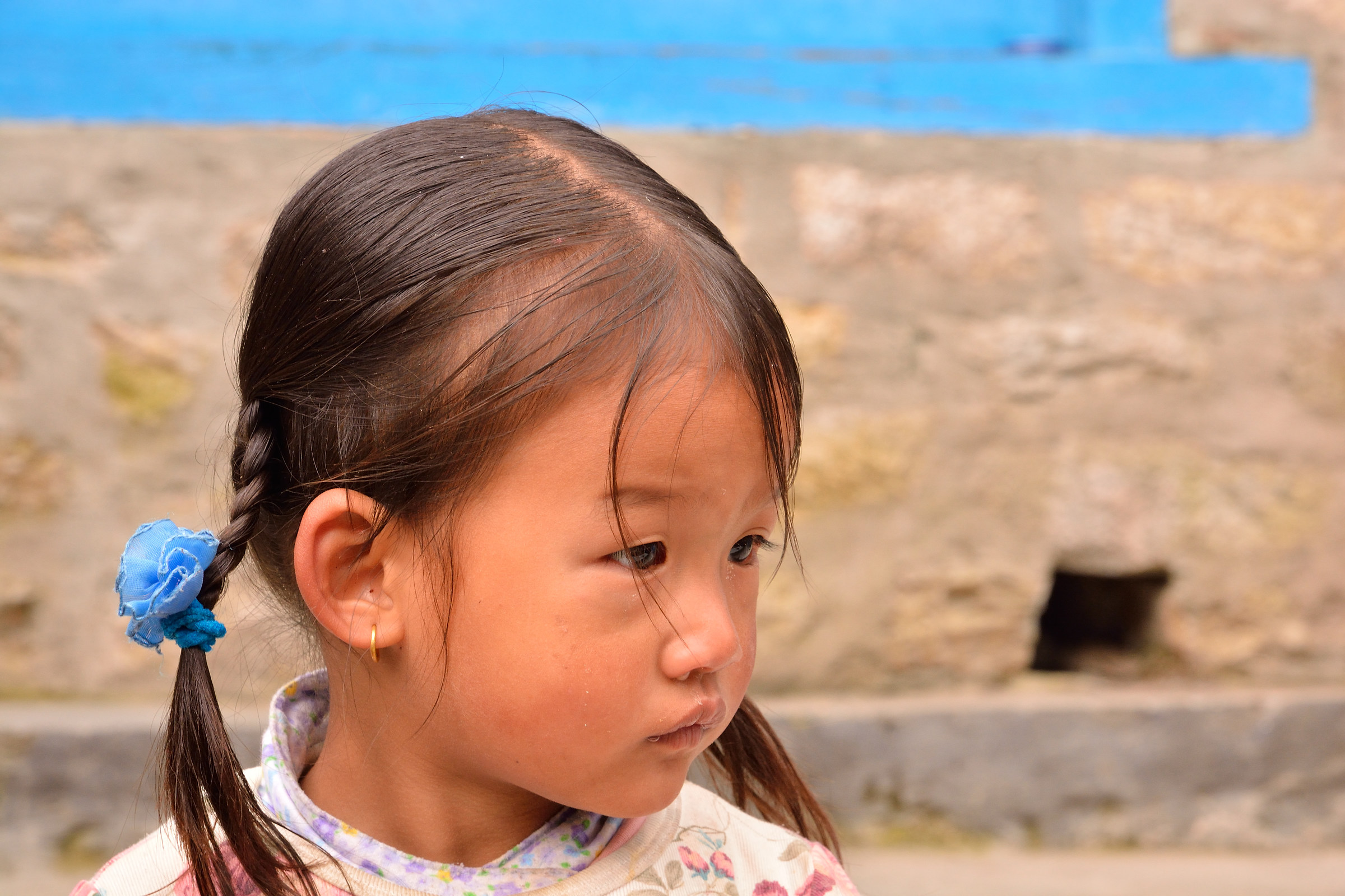 nepal - portrait of little girl in the village of Phakding...