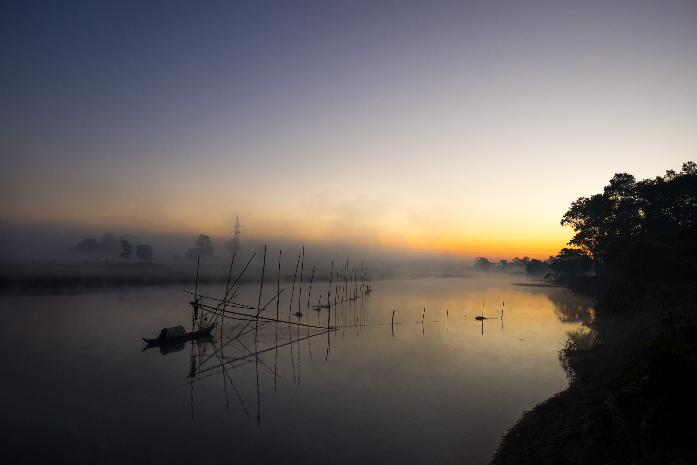 Sunrise. Fisherman island of Majuli, Assam. India....