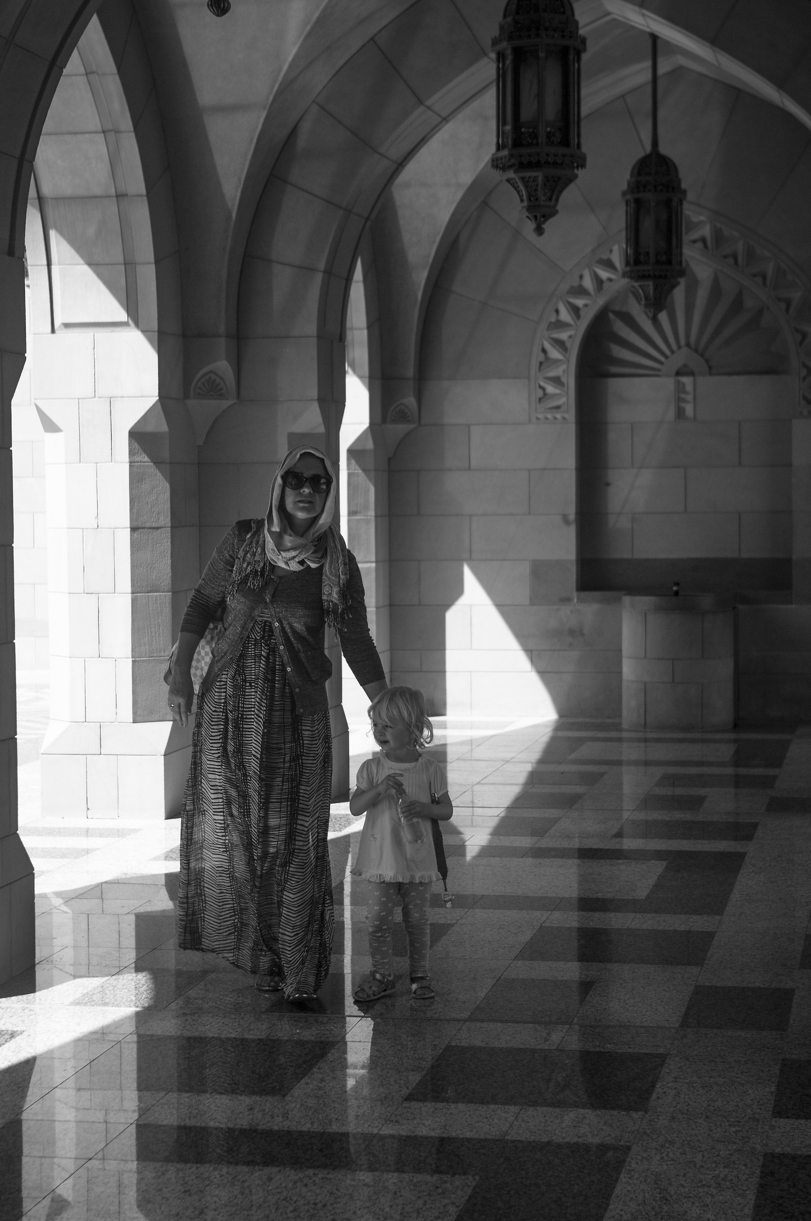 Visitors to the great Sultan Qaboos Grand Mosque...