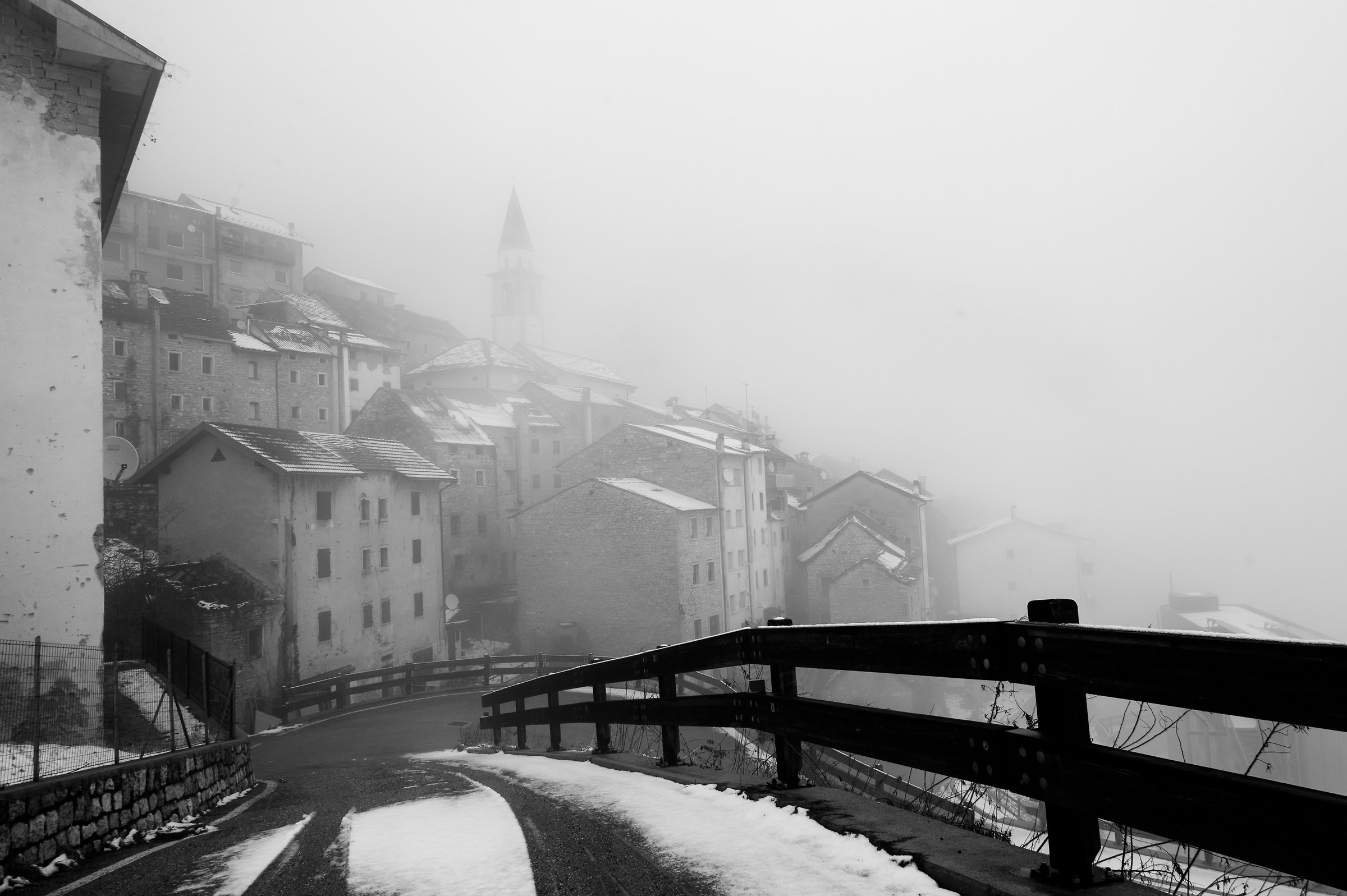 the village of Casso shrouded in fog...
