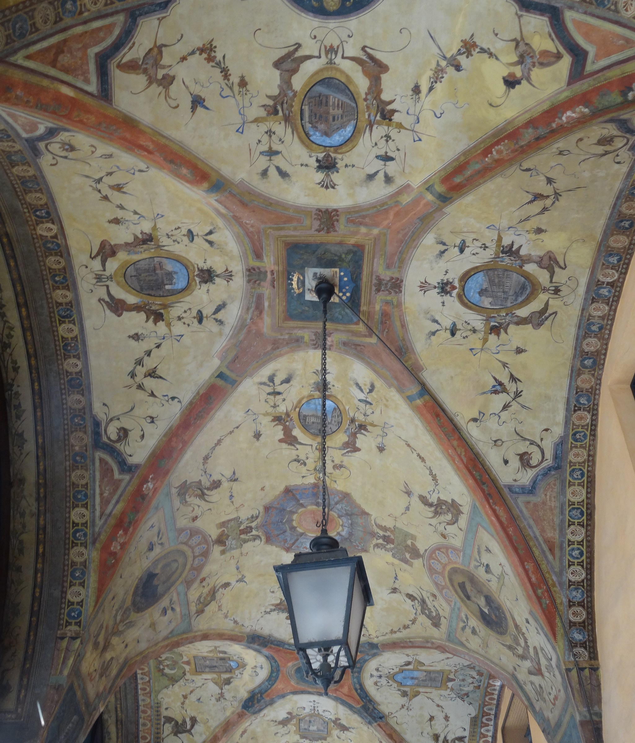 Portico frescoes in Via Emilia Centro...