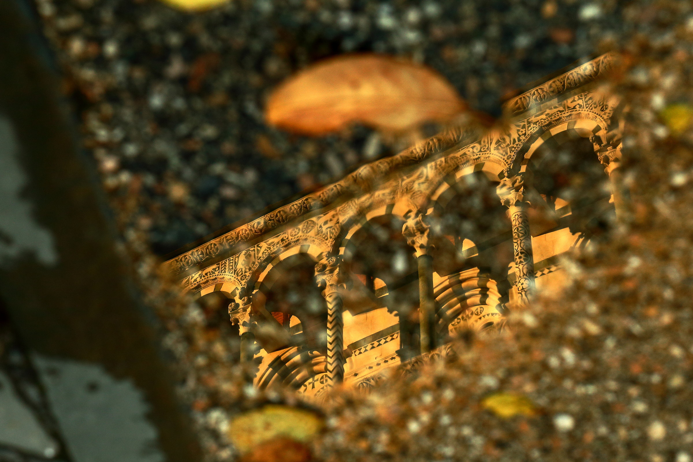 Detail of the Duomo reflected in a pool of water...