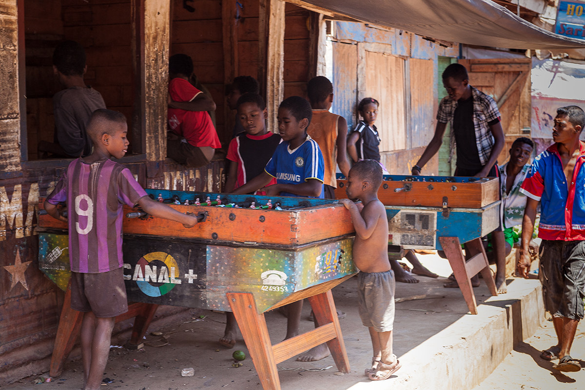 Madagascar, village: sighs at table football....