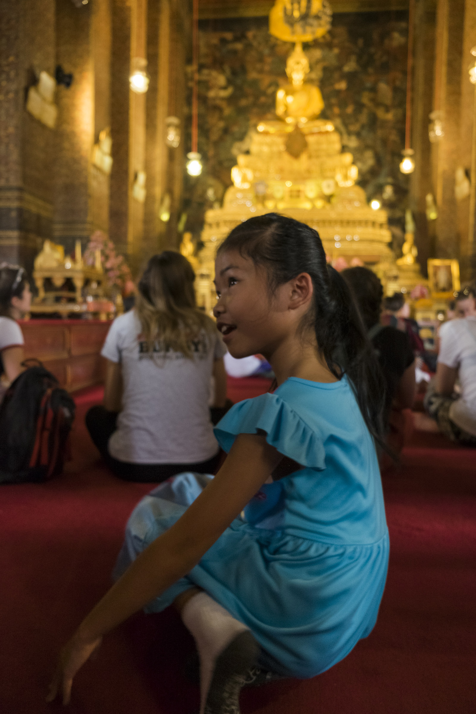 little girl in a temple in BKK ...