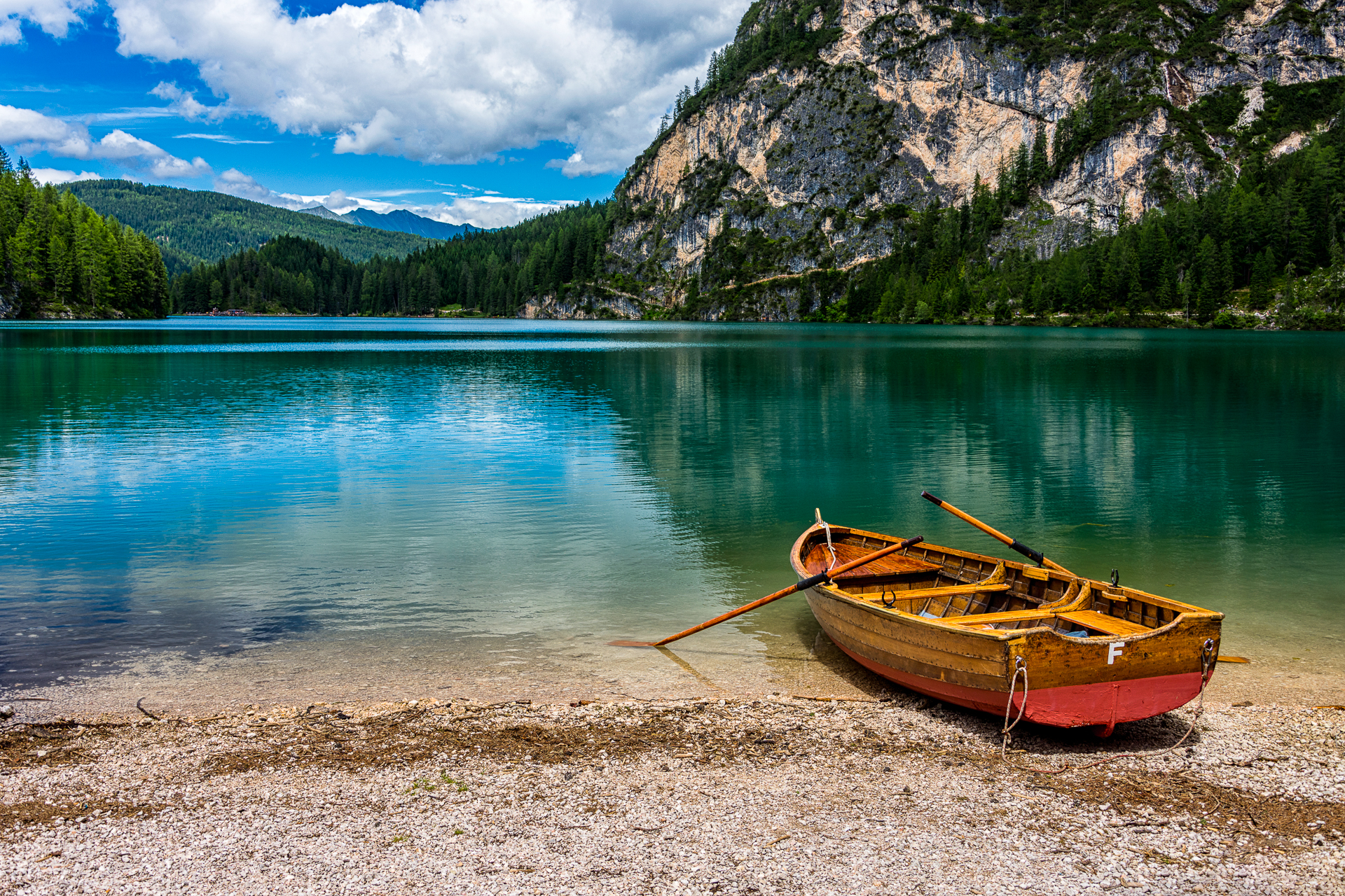 Boat on the shore on lake Braies...