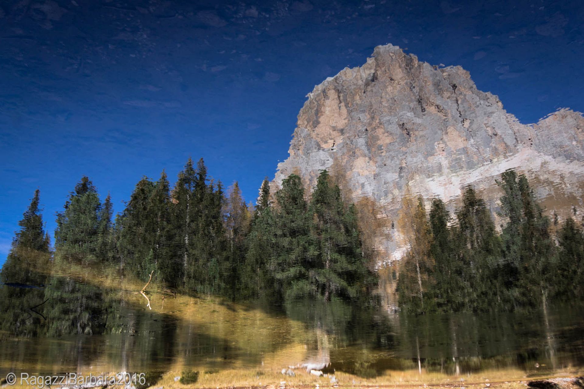 The Antelao is reflected in Lake Bai de Dones...