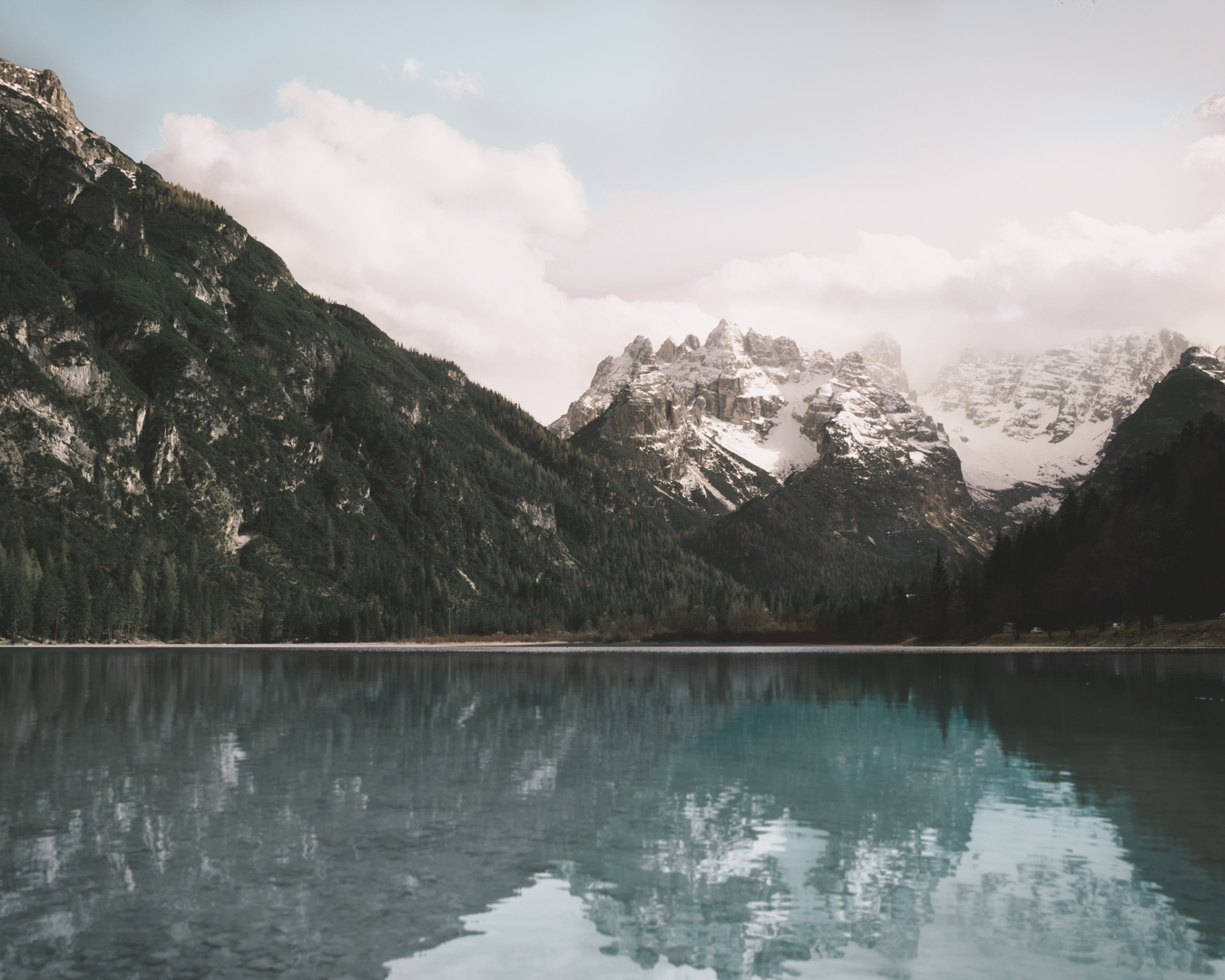 The Cristallo group is mirrored on Lake Landro...