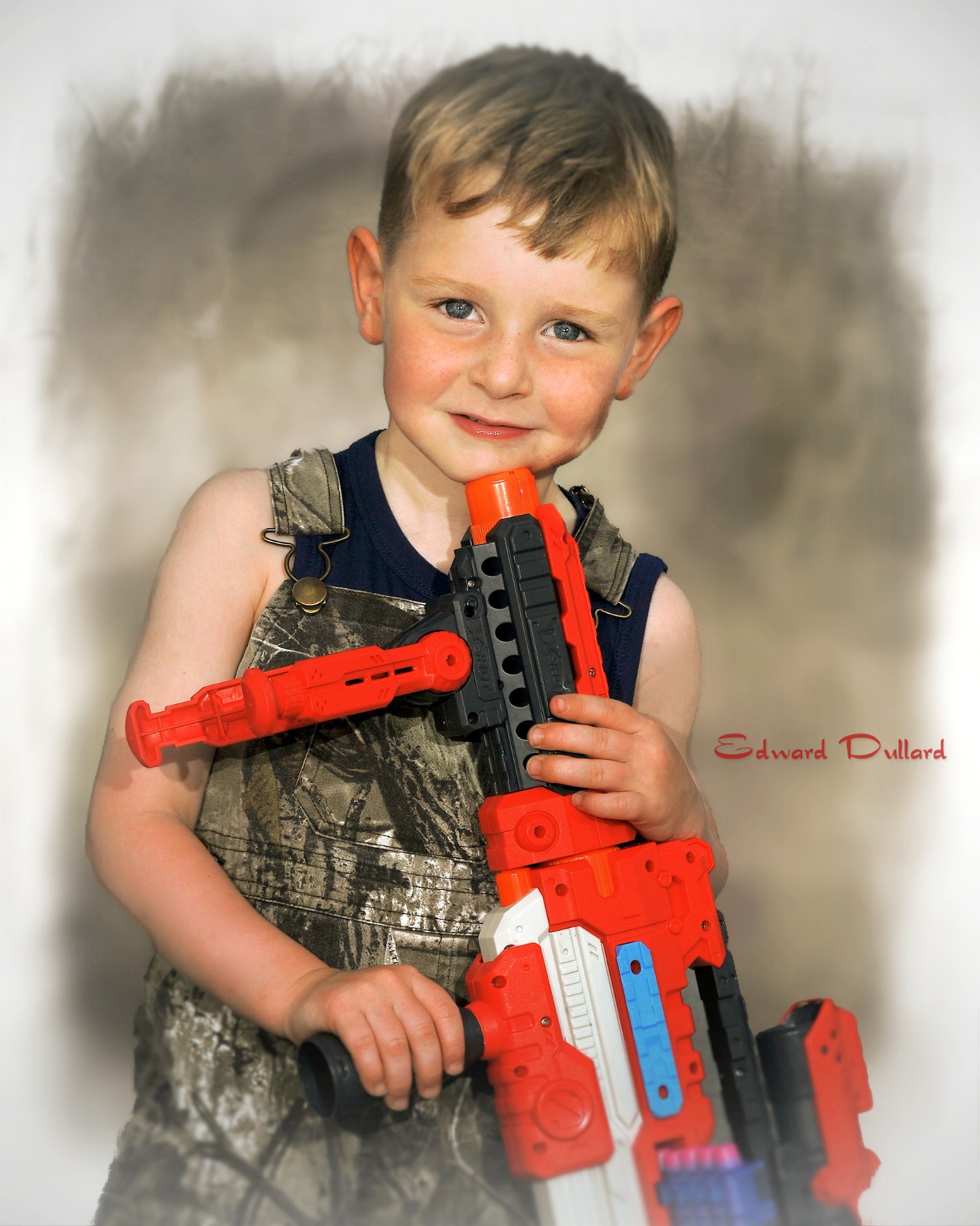 Little boy with a big gun....